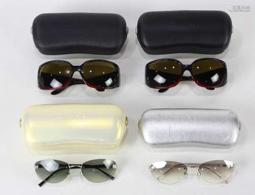 (lot of 4) Chanel sunglasses group, one having red frames accented with rhinestones, two having