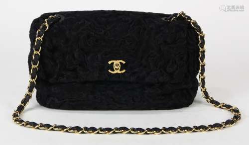 Chanel Persian lamb medium flap handbag, executed in black, with strap, label to interior, Neiman