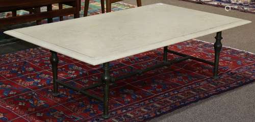 Hollywood Regency style occasional table, having a rectangular marble top, above a brass frame, 15