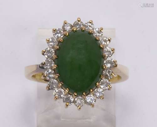 Jadeite, diamond and 14k yellow gold ring Centering (1) oval jadeite cabochon, measuring