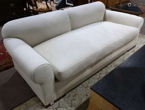 A. Rudin San Francisco designer sofa, having a square profile in beige, with a single seat