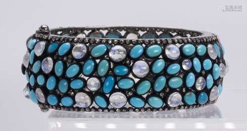 Turquoise, moonstone, diamond and blackened silver bracelet Featuring numerous oval turquoise