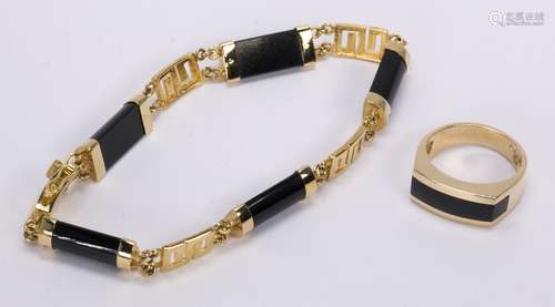 Jade and yellow gold jewelry suite Including 1) black jadeite segment, 18k yellow gold Greek key