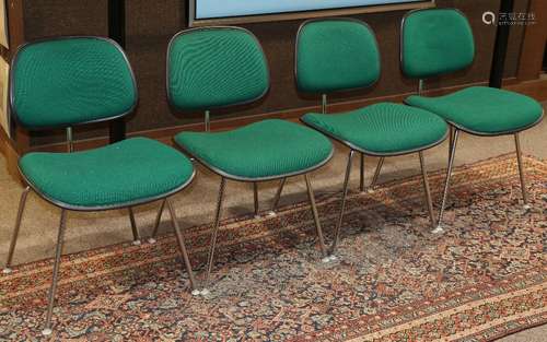 (lot of 4) Eames for Herman Miller DCM green upholstered chairs, each having an upholstered seat and