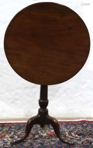 Chippendale mahogany tilt top tea table, late 18th century, having a circular top, above a turned