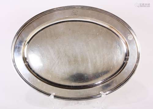 Tiffany & Co. sterling silver serving platter, having an oval form, the border with a centered