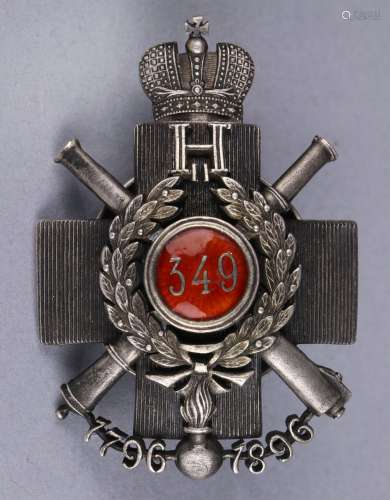 Russian military jeton, in the form of a cross, centered with a wreath surrounding the number 