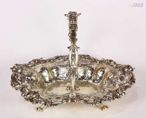 American sterling silver swing handle basket, executed in the Rococo taste, the shaped and pierced