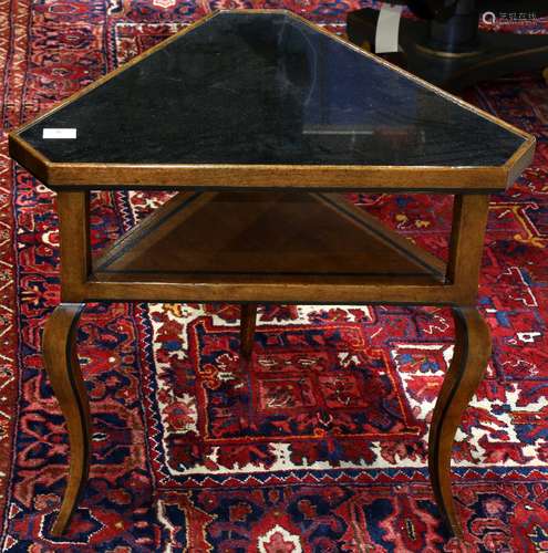 Italian Moderne style occasional table, having a black marble top, above a lower tier, and rising on