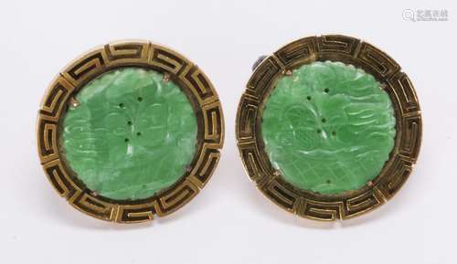 Pair of jadeite and 14k yellow gold cufflinks Featuring (2) carved jadeite discs, measuring