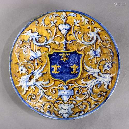 Italian Florentine majolica plate possibly 16th century, the circular form with stylized griffin and