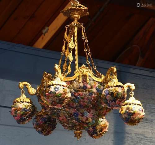 Art Nouveau style floriform bronze and art glass chandelier, having a central pendant with