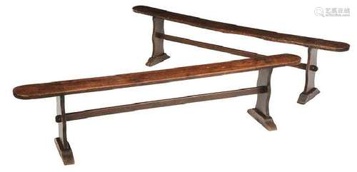 A Pair Baroque Walnut and Oak Trestle Benches