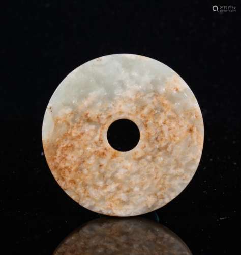 CHINESE ARCHAISTIC JADE BI DISC WITH RUSSET INCLUS