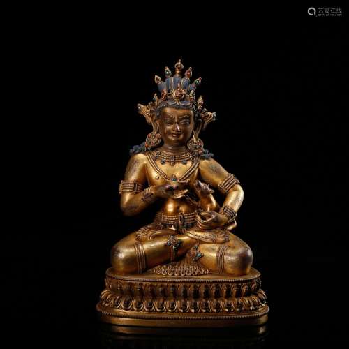 CHINESE GILT BRONZE FIGURE OF JAMBHALA