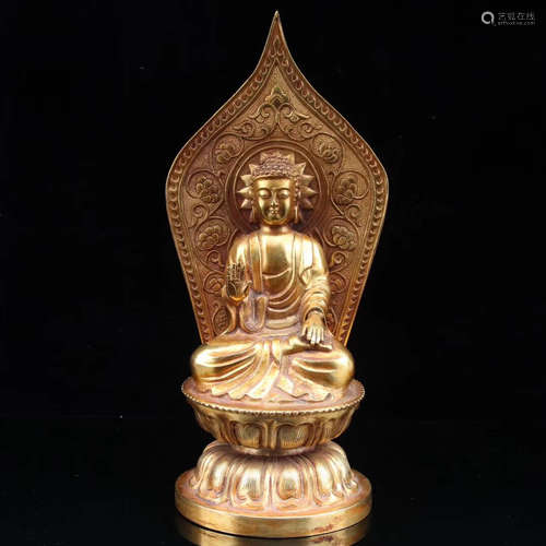 A GILT-BRONZE FIGURE SAKYAMUNI FIGURE