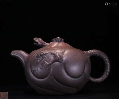 A FISH AND DRAGON PATTERN ZISHA TEAPOT