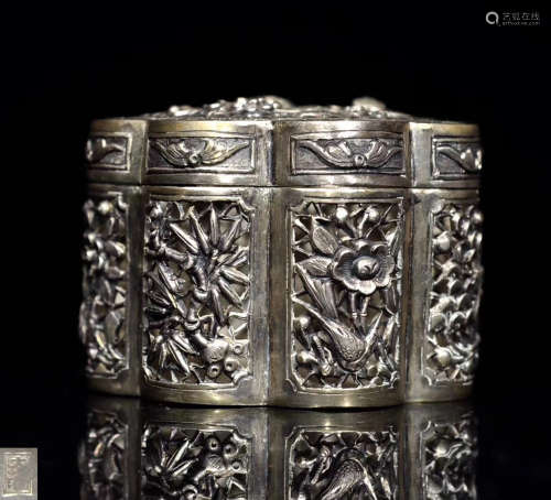 A SILVER MOLDED FLORAL SHAPED BOX