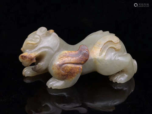 A HETIAN JADE BEAST SHAPED PENDANT