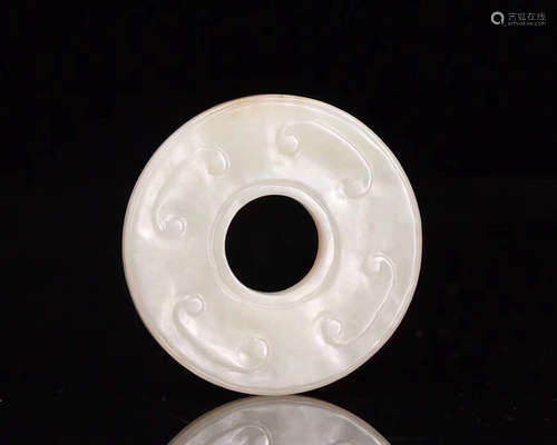 A RING-SHAPED HETIAN WHITE JADE PENDANT