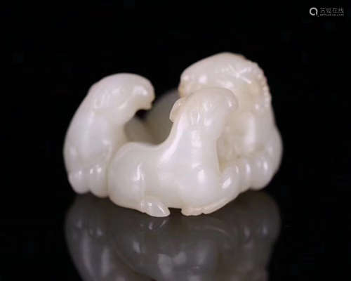 A HETIAN JADE THREE GOATS SHAPED PENDANT