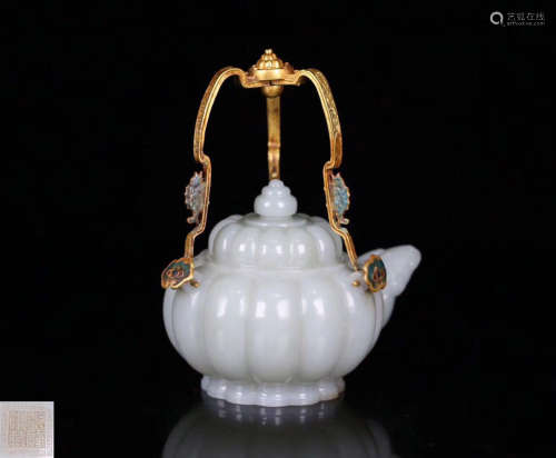 A HETIAN JADE CARVED MELON SHAPED TEAPOT