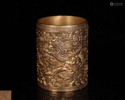 A GILT BRONZE MOLDED BRUSH POT