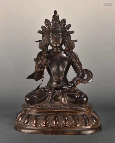 A BRONZE MOLDED BUDDHA STATUE