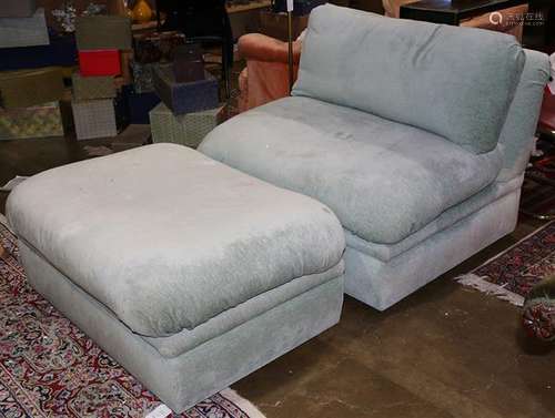 Modern upholstered chair with ottoman