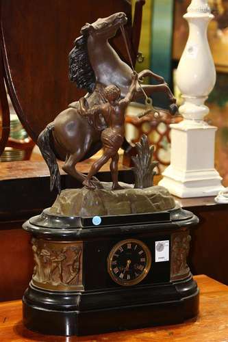 Neoclassical revival style figural mantle clock