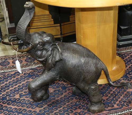 Patinated bronze figural sculpture depicting an elephant