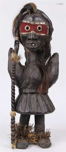 West African carved wood warrior figure