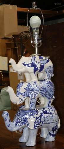 Modern table lamp with three graduated ceramic elephants