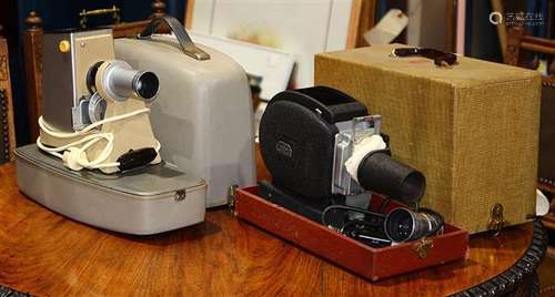 Two vintage cased projectors