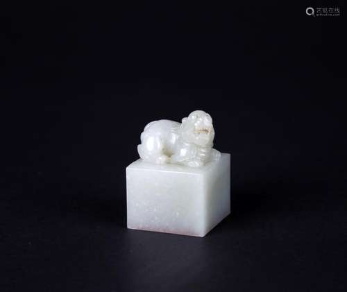 A CELADON JADE 'MYTHICAL' FINIAL SEAL, QING DYNASTY