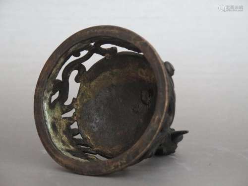 A BRONZE TRIPOD DRAGON-HANDLED CENSER AND COVER, XUANDE MARK BUT QING DYNASTY