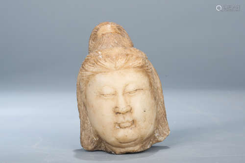 Chinese carved stone of a buddha head.