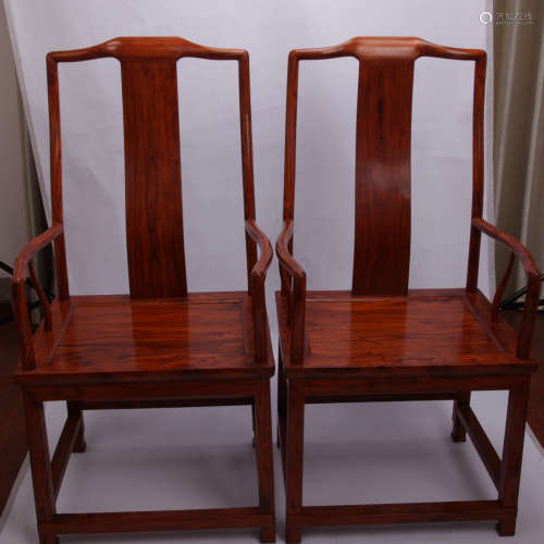 Pair of Chinese Huanghuali arm chairs.