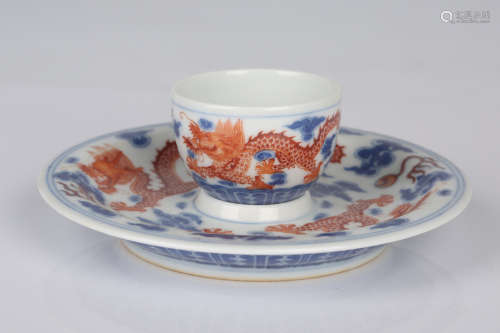 Set of Chinese blue and white and iron red porcelain cup and saucer, Yongzheng mark.