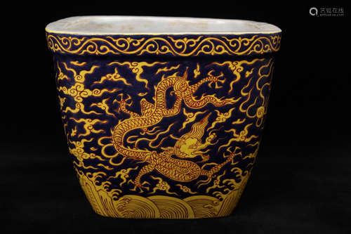 Chinese black glazed yellow dragon decorated porcelain box, Ming mark.