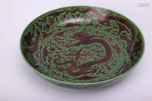 Chinese green glaze porcelain charger with dragon decoration, Kangxi mark.