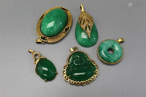 5 Chinese stone pendants.