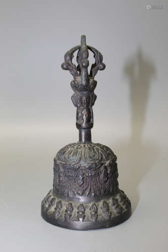 A Tibetan bronze bell.