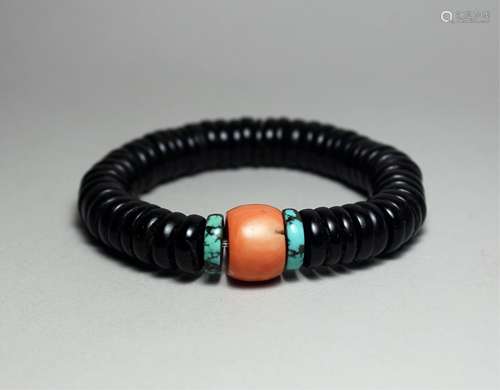 CHINESE CORAL AND COCONUT SHELL BRACELET