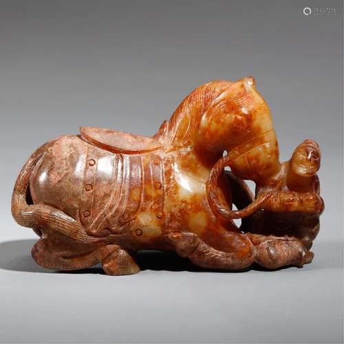 CHINESE ARCHAIC JADE CARVED HUNNI LEADING A HORSE