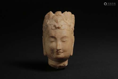 White stone carved avalokitesvara head