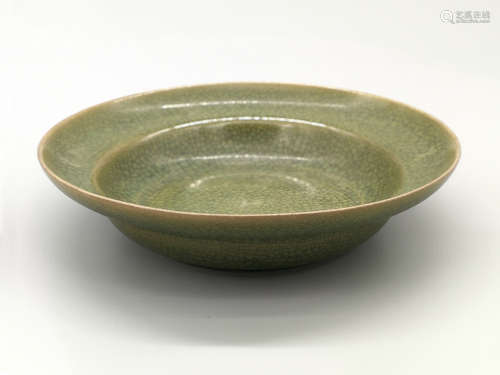 China,Guan Yao dish with its opening folded outward.