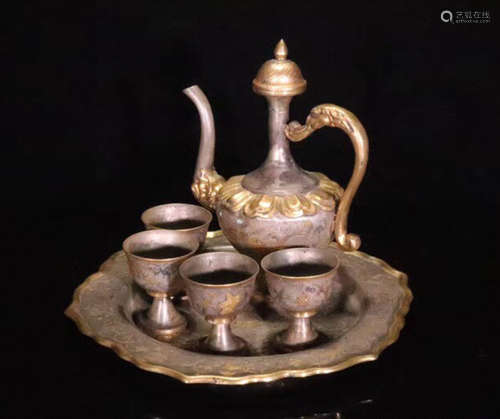 SET OF GILT BRONZE WINE POT AND CUPS