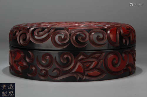A RED LACQUER FLORAL PATTERN BOX