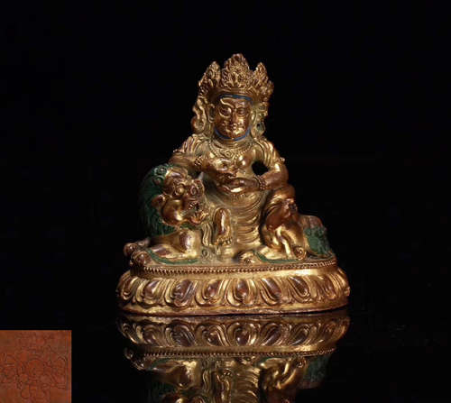 A GILT BRONZE MOLDED WENSHU BUDDHA STATUE